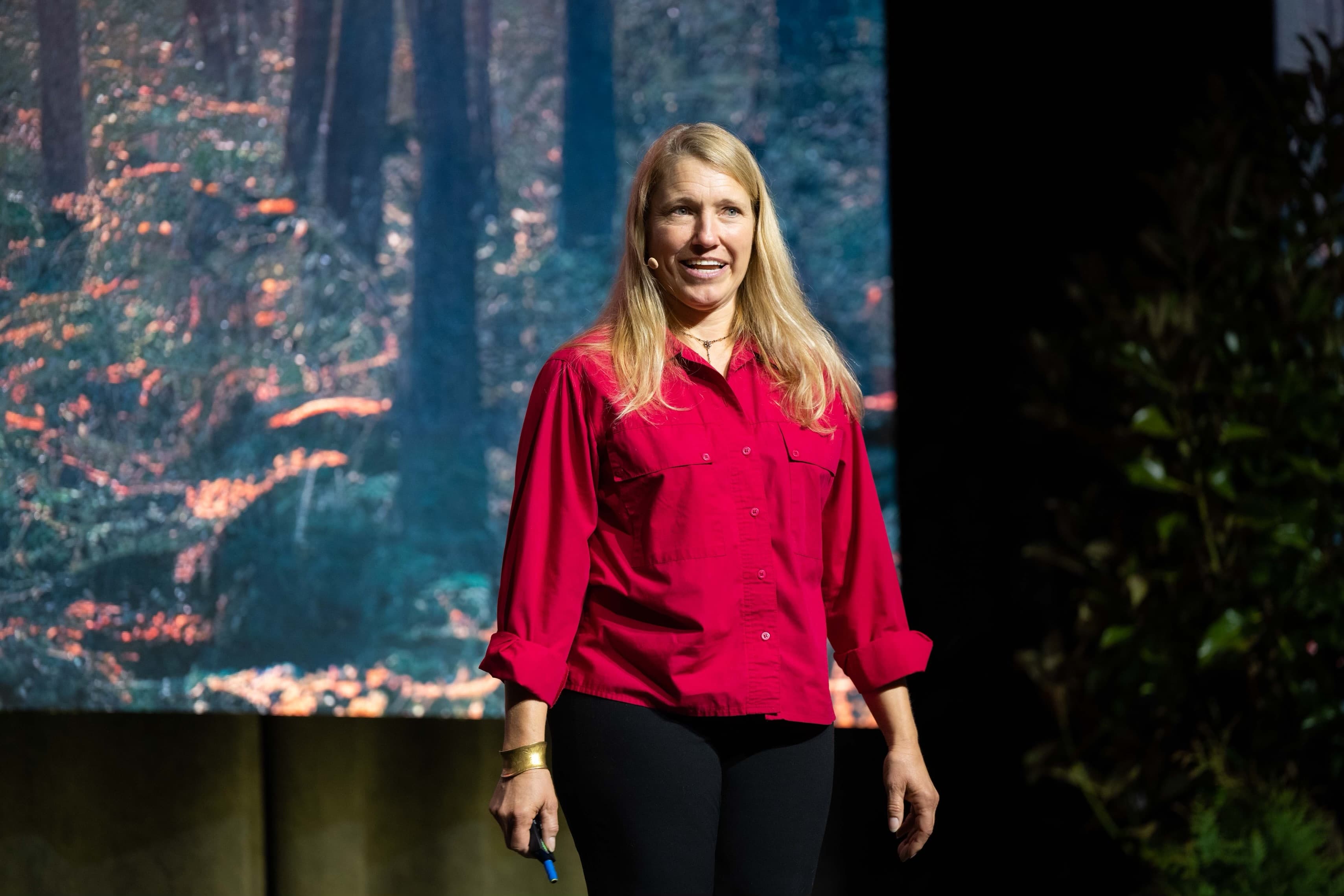 Jessie Krebs speaking on stage